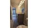 Bathroom with granite vanity, hardwood floors and open entry to bedroom space at 6206 Ripple Way # 89, South Fulton, GA 30349
