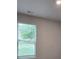 Bedroom with window and partial view of an outdoor tree at 6206 Ripple Way # 89, South Fulton, GA 30349