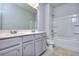 Bright bathroom with double vanity, toilet, and shower/tub combo at 6214 Ripple Way # 91, South Fulton, GA 30349
