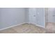 Bedroom featuring neutral carpet and easy access to other rooms at 6214 Ripple Way # 91, South Fulton, GA 30349