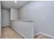 Upstairs hallway showcasing a neutral palette and carpeted floors at 6214 Ripple Way # 91, South Fulton, GA 30349