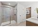 Bathroom with a large walk-in shower and double vanity at 6076 Marigold Way, Atlanta, GA 30349