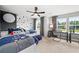 Bedroom with twin beds, a desk, and a celestial theme at 6076 Marigold Way, Atlanta, GA 30349