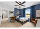 Baseball-themed bedroom with a desk and full-size bed at 6076 Marigold Way, Atlanta, GA 30349