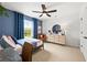 Baseball-themed bedroom with a dresser and full-size bed at 6076 Marigold Way, Atlanta, GA 30349