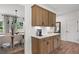 Butlers pantry with wood cabinets and quartz countertop at 6076 Marigold Way, Atlanta, GA 30349