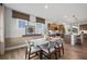 Modern dining area with light and airy feel, open to kitchen at 6076 Marigold Way, Atlanta, GA 30349