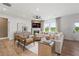 Relaxing living room with sectional sofa and fireplace at 6076 Marigold Way, Atlanta, GA 30349