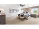 Main bedroom with plush carpet and plenty of natural light at 6076 Marigold Way, Atlanta, GA 30349