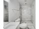 Modern bathroom featuring marble tile shower and updated vanity at 1909 Meadow Ln, Decatur, GA 30032