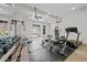 Bright gym with treadmills, weights, and various exercise equipment at 1965 Carlotta Ct, Atlanta, GA 30345