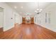 Large living room with hardwood floors, fireplace, and built-in bookcases at 1965 Carlotta Ct, Atlanta, GA 30345