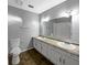Bathroom featuring a double sink vanity and a shower-tub combination at 4762 Huntsman Bnd, Decatur, GA 30034