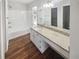 Bathroom featuring granite countertops, new fixtures, and a shower-tub combo at 6235 Marbut Farms Trl, Lithonia, GA 30058