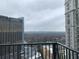 Beautiful distant city view overlooking a neighborhood from the balcony at 195 14Th Ne St # 2103, Atlanta, GA 30309