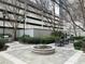 Outdoor courtyard featuring garden, seating, and landscaping at 195 14Th Ne St # 2103, Atlanta, GA 30309