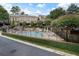 Community pool with lounge chairs and surrounding landscaping at 37 Honour Nw Ave, Atlanta, GA 30305