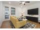 Relaxing living area with large TV and access to balcony at 2673 Caruso Way, Atlanta, GA 30339