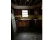 Kitchen with wooden cabinets and tiled floor at 1581 Se Woodland Se Cir, Atlanta, GA 30316