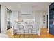 Modern kitchen with bright white cabinets, marble countertop, and stainless steel appliances at 2575 Peachtree Ne Rd # 14A, Atlanta, GA 30305