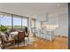 Bright, open-concept kitchen featuring an island with seating and scenic outdoor views at 2575 Peachtree Ne Rd # 14A, Atlanta, GA 30305