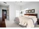 Comfortable bedroom with a king-size bed, carpet, and closet access at 3445 Stratford Ne Rd # 3601, Atlanta, GA 30326