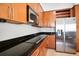 Kitchen with stainless steel refrigerator, granite counters, and lots of storage space at 3445 Stratford Ne Rd # 3601, Atlanta, GA 30326