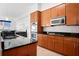 Updated kitchen featuring granite countertops, stainless appliances, and a breakfast bar at 3445 Stratford Ne Rd # 3601, Atlanta, GA 30326
