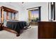 Spacious main bedroom with a large window overlooking the city and a sliding glass door to the balcony at 3445 Stratford Ne Rd # 3601, Atlanta, GA 30326