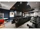 Modern theater room with comfortable seating and a large screen for an immersive viewing experience at 3445 Stratford Ne Rd # 3601, Atlanta, GA 30326