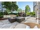 Outdoor lounge with comfortable seating, fire pit, and view of the Paramount sign at 3445 Stratford Ne Rd # 3601, Atlanta, GA 30326