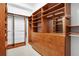 Organized walk-in closet with custom shelving and drawer system at 3445 Stratford Ne Rd # 3601, Atlanta, GA 30326