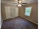 Bedroom with carpet, two closets, window, and neutral colored walls at 215 Moseley Crossing Dr, Stockbridge, GA 30281