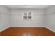 Walk-in closet with hardwood floors and shelving at 105 Dockstreet Aly, Peachtree City, GA 30269