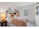 Cozy bedroom with soft lighting, decorative wall art, and comfortable furnishings at 3136 Washburn Se St, Atlanta, GA 30354