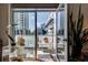 Private balcony offering city views, creating a perfect outdoor retreat at 805 Peachtree Ne St # 401, Atlanta, GA 30308
