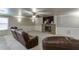 Finished basement with fireplace and comfortable seating at 3172 Trinity Grove Dr, Dacula, GA 30019