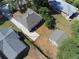 Aerial view of a house with backyard, detached garage, and neighboring properties at 1677 S Gordon Sw St, Atlanta, GA 30310