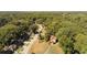 Aerial view of house nestled in a wooded neighborhood at 1677 S Gordon Sw St, Atlanta, GA 30310