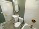 Renovated bathroom with white subway tile, vanity, and updated toilet at 1677 S Gordon Sw St, Atlanta, GA 30310