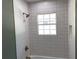 Updated bathroom with white subway tile, a new vanity, and modern fixtures at 1677 S Gordon Sw St, Atlanta, GA 30310