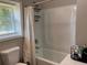 Bathroom with tub shower, vanity and toilet at 1677 S Gordon Sw St, Atlanta, GA 30310