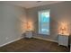 Bright bedroom with neutral walls and carpeted floors at 1677 S Gordon Sw St, Atlanta, GA 30310