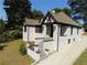 Charming white brick house with brown trim at 1677 S Gordon Sw St, Atlanta, GA 30310