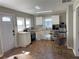 Modern kitchen with white cabinets and stainless steel appliances at 1677 S Gordon Sw St, Atlanta, GA 30310