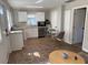 Updated kitchen, white cabinets, and breakfast bar at 1677 S Gordon Sw St, Atlanta, GA 30310
