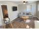 Cozy living room features a sofa, coffee table, and TV at 1677 S Gordon Sw St, Atlanta, GA 30310