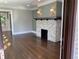 Living room with hardwood floors, fireplace, and recessed lighting at 1677 S Gordon Sw St, Atlanta, GA 30310