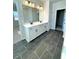 Modern bathroom with double vanity and stylish tile flooring at 738 Crossroad Ct, Powder Springs, GA 30127