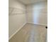 Carpeted walk-in closet features wire shelving at 738 Crossroad Ct, Powder Springs, GA 30127